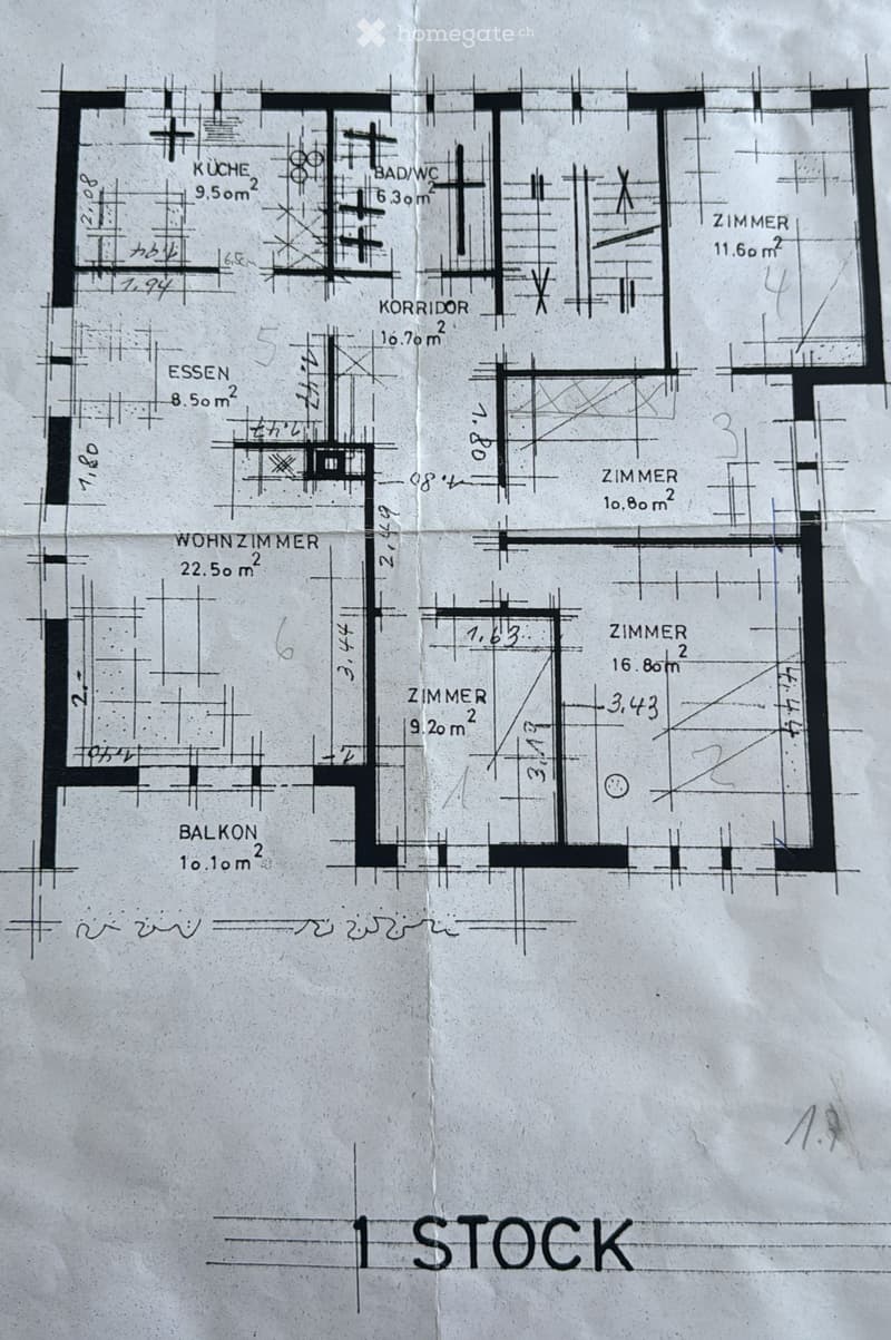 Floor plan of the first floor showing a living room, kitchen, dining area, bathroom, hallway, and several bedrooms, including a balcony.
