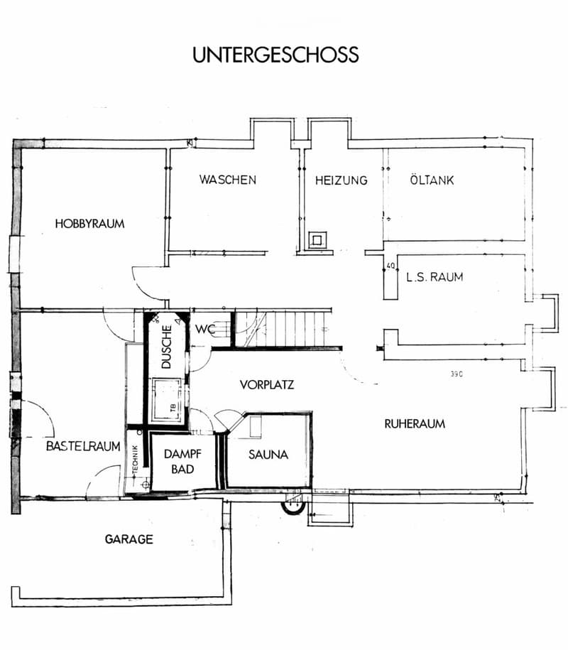 Floor plan of the basement level showing rooms including hobby room, laundry, heating, oil tank, WC, entrance hall, sauna, steam bath, relaxation room, and garage.