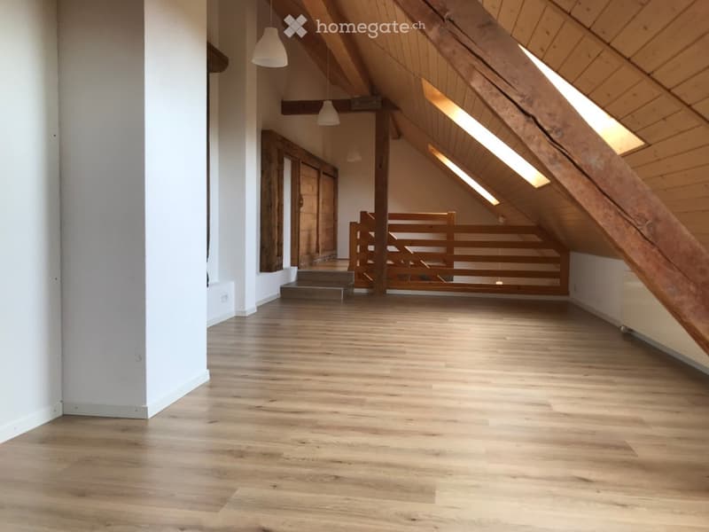 empty attic room, wooden beams, wooden floor, wooden staircase, wooden railing