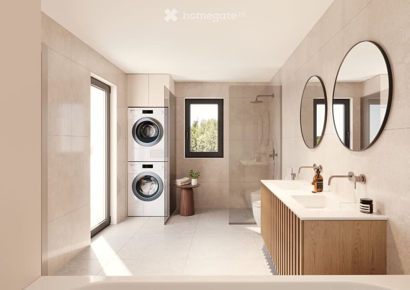 Modern bathroom with double sink, large mirrors, washing machine, and a small plant on a wooden stool.