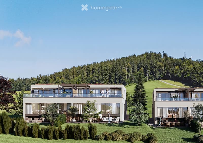 Modern two-story house with large windows, balconies, and a spacious lawn surrounded by trees and greenery.