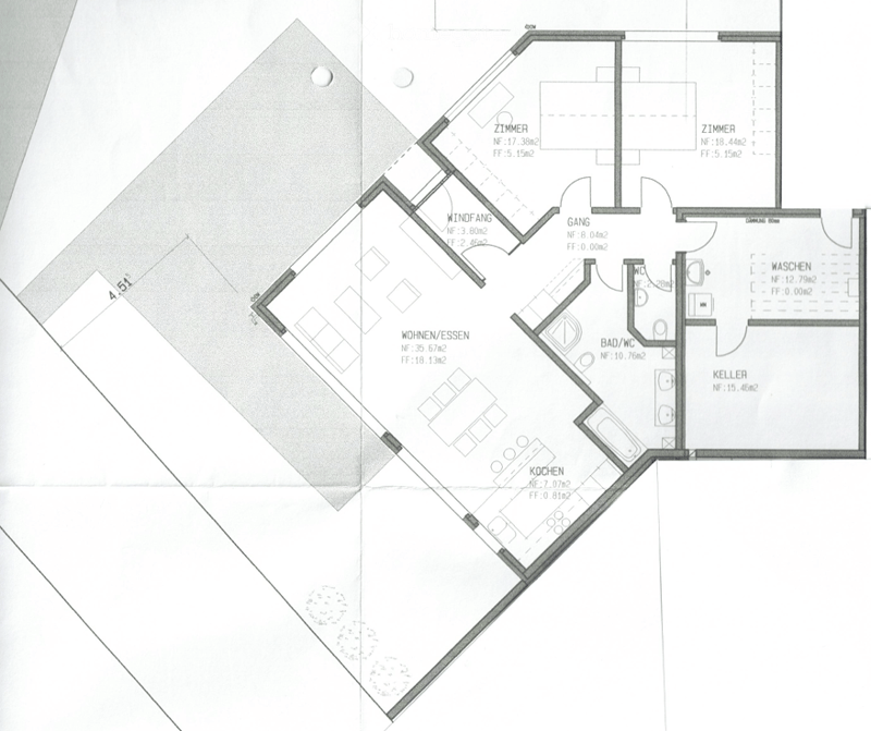 Floor plan of a house with living/dining area, kitchen, two bedrooms, bathroom, hallway, and basement.