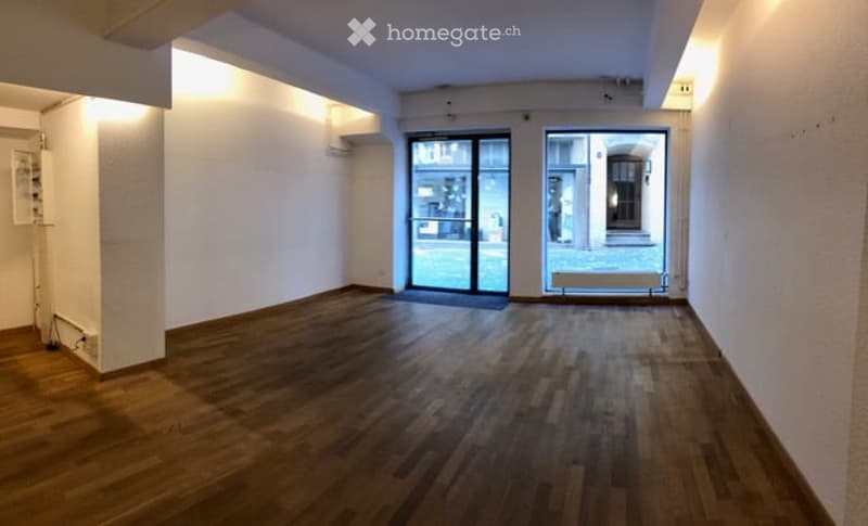 empty room, wooden floor, white walls, glass doors, windows