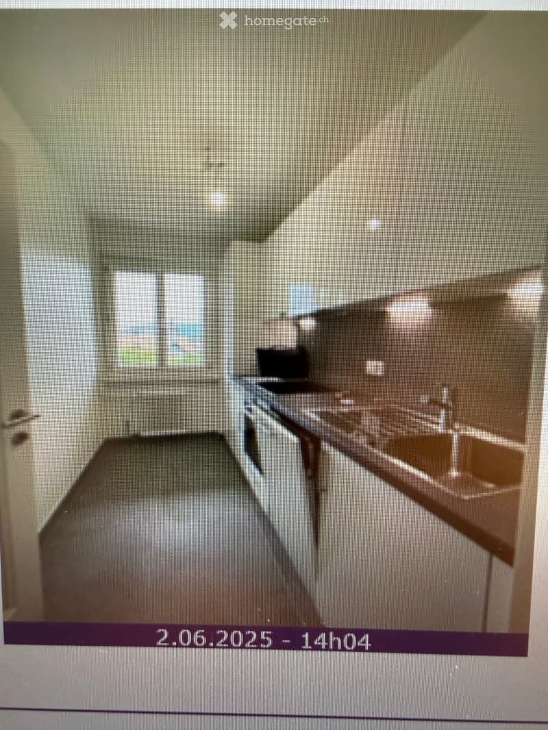 Completely empty room with bare walls and wooden floor. No furniture or equipment.