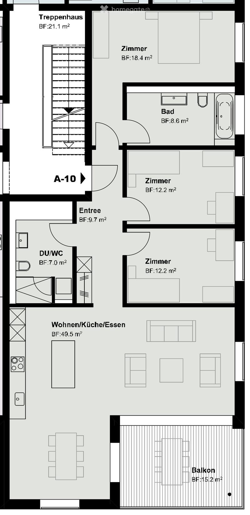 Floor plan of a residential unit with multiple rooms including a staircase, living/dining/kitchen area, bedrooms, bathrooms, and a balcony.