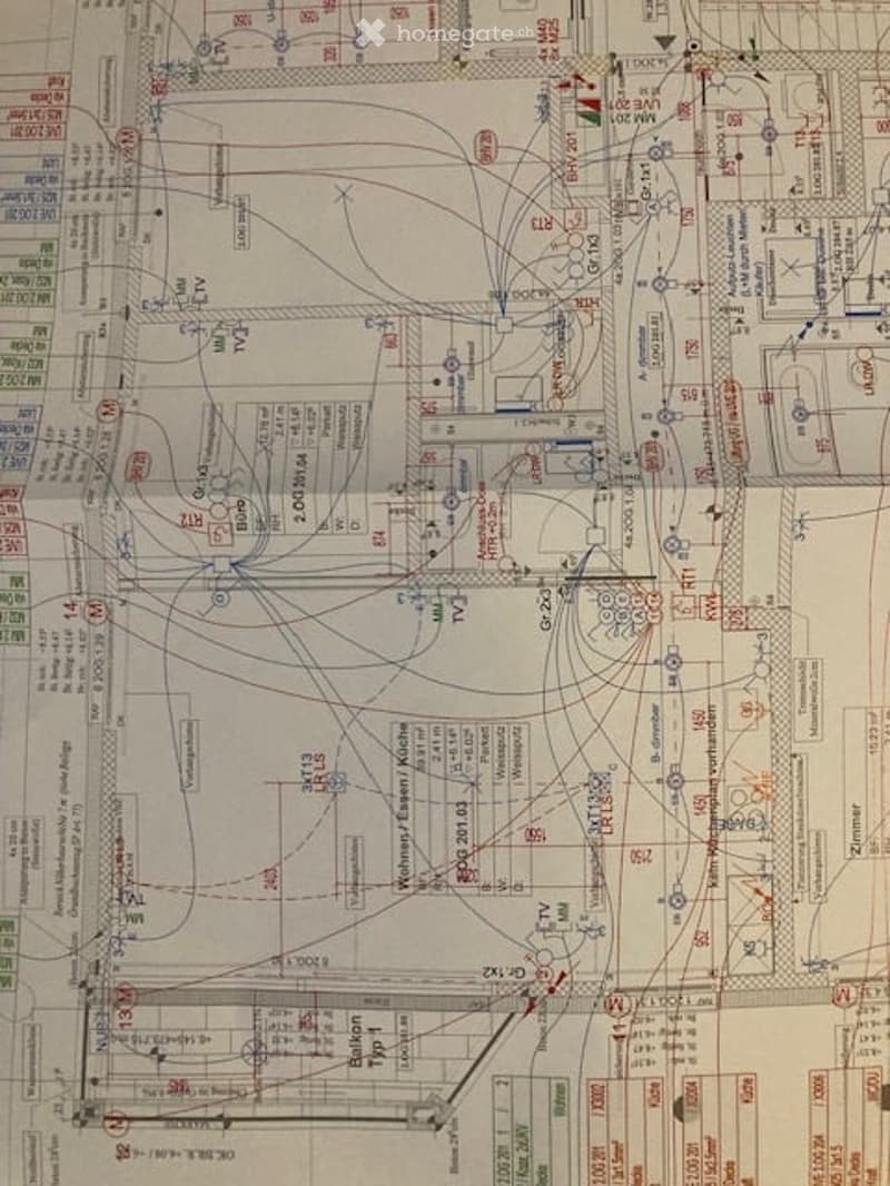 Detailed floor plan of a building, showing multiple rooms, corridors, and labeled areas with measurements and room numbers.