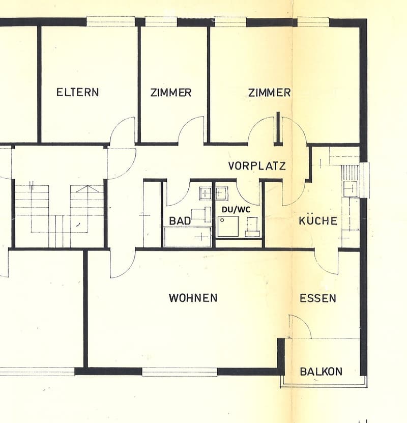 Floor plan showing a multi-room layout including a living area, dining area, kitchen, bathroom, two bedrooms, and a balcony.