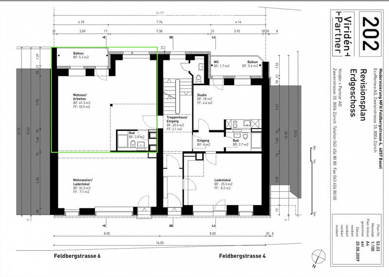 Floor plan of a multi-unit building showing a living/work area, studio, bathroom, entrance, and commercial space.