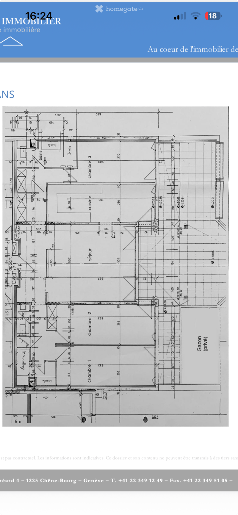 Floor plan showing a house layout with labeled rooms including living room, kitchen, bedrooms, bathrooms, and a garage.