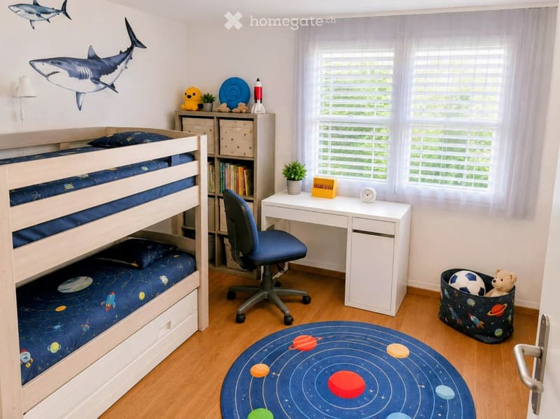 A well-lit children's bedroom with a bunk bed, desk, bookshelf, and various toys. The room features a solar system-themed rug and a wall-mounted shark decoration.