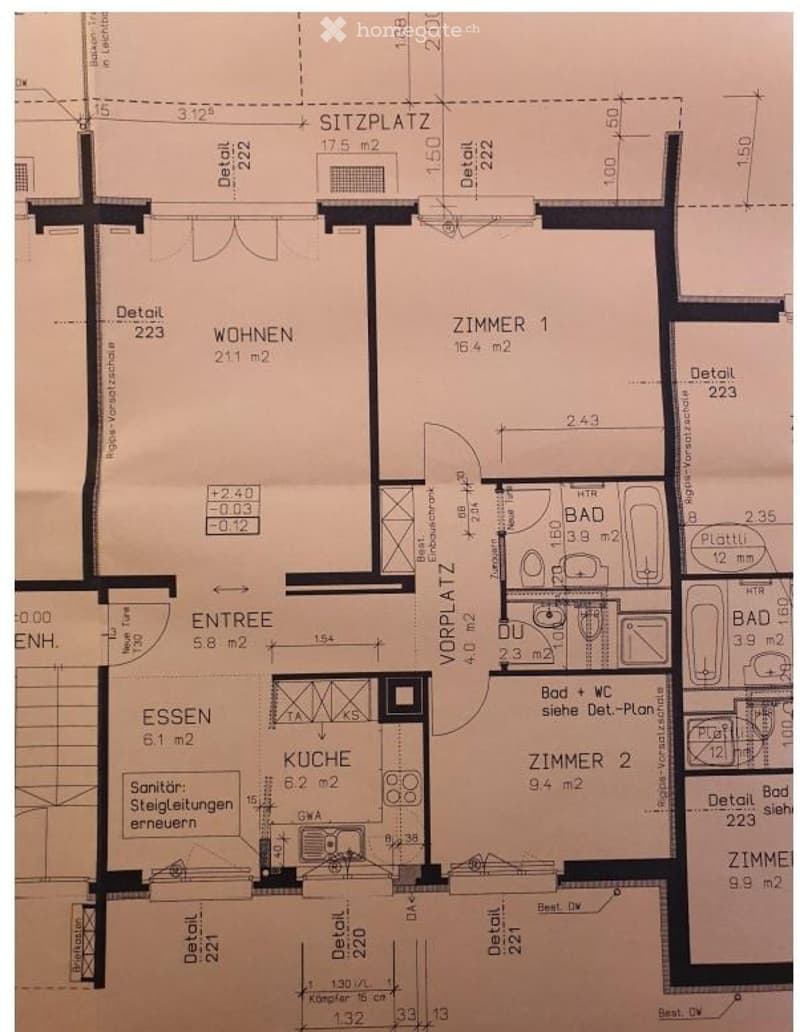 Floor plan showing a multi-room layout including a living area, dining area, kitchen, two bedrooms, two bathrooms, and an entrance area.