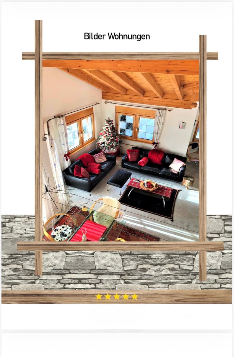 A cozy living room with exposed wooden beams, large windows, and a stone fireplace. The room features two black leather sofas with red and pink cushions, a glass coffee table with a plaid blanket, a small black ottoman, and a dining area with a glass tabl
