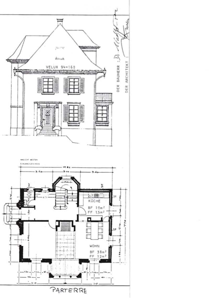 Architectural floor plan showing a two-story house with labeled rooms including a kitchen and living area on the ground floor.