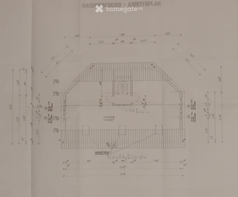Detailed floor plan of a workshop or garage space, including labeled dimensions, entry points, and structural elements.