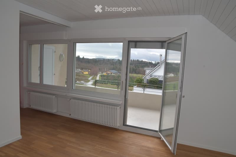 empty room, wooden floor, white walls, large windows, balcony, radiators, open door