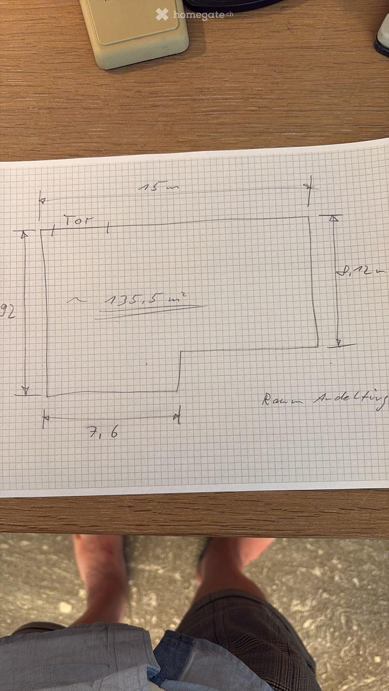 Hand-drawn floor plan on graph paper, showing room dimensions and layout. Includes measurements and labels for room and door.