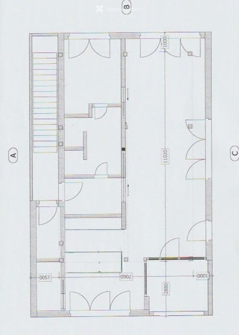 Floor plan of a residential unit with labeled rooms including a living area, kitchen, bedrooms, and bathrooms.