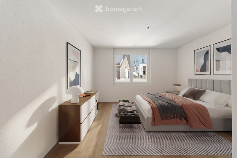 Modern bedroom with a large bed, nightstand, lamp, bench, and artwork on the walls. The room features wooden flooring and large windows with a view of neighboring houses.
