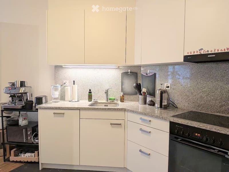 {"type": "Kitchen", "objects": ["coffee maker", "microwave", "oven", "fridge", "sink", "cabinets", "cutting board", "toaster", "cupboard", "bottle", "faucet", "cup", "oven", "oven", "oven", "oven", "oven", "oven", "oven", "oven", "oven", "oven", "oven", "