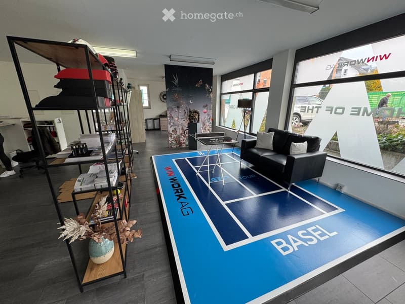 Tennis court themed room, couch with pillows, table, shelf, windows