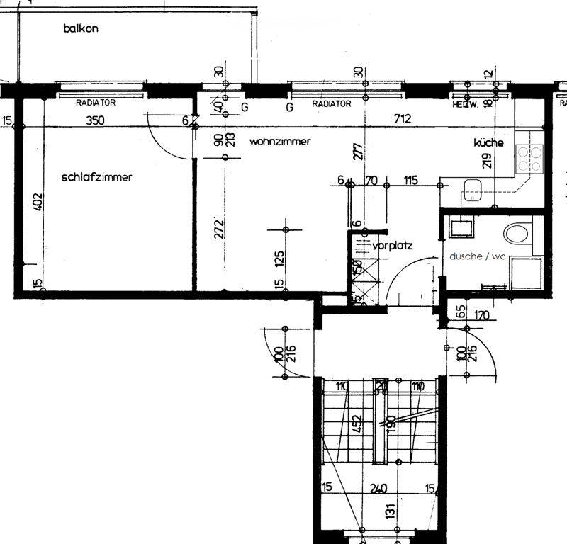 Floor plan showing a living room, bedroom, kitchen, bathroom, hallway, and balcony.