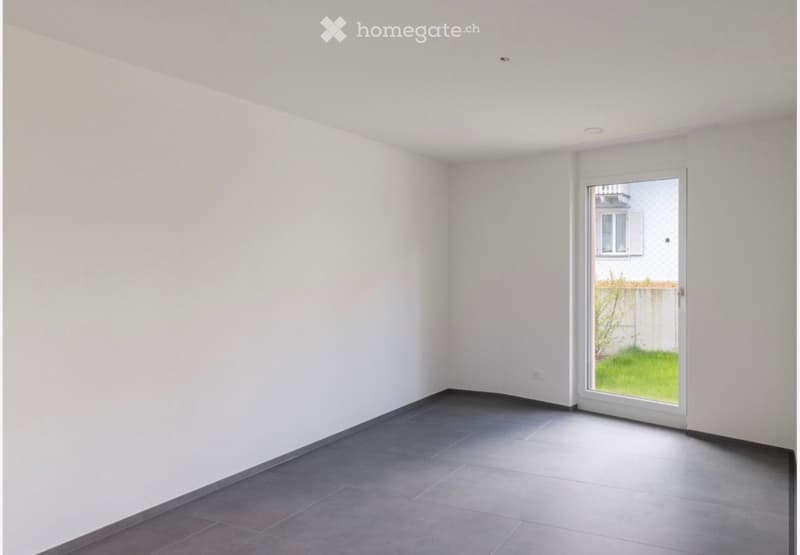 empty room, white walls, gray tiles, sliding glass door, grassy view