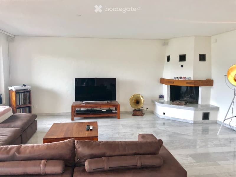 Wohnzimmer mit Cheminée