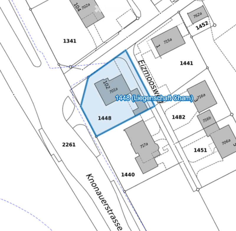 A detailed plot plan showing the layout of a residential area with multiple buildings and numbered plots.