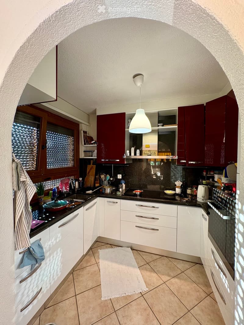 {"type": "Kitchen", "objects": ["sink", "faucet", "oven", "stove", "cabinets", "cupboard", "fridge", "cup", "bowl", "frying pan", "oven", "cupboard", "cupboard", "cupboard", "cupboard", "cupboard", "cupboard", "cupboard", "cupboard", "cupboard", "cupboard