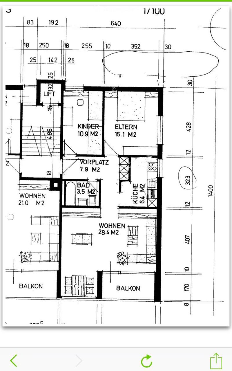 Floor plan of a residential unit with labeled rooms including living area, kitchen, bedrooms, bathroom, and balconies.