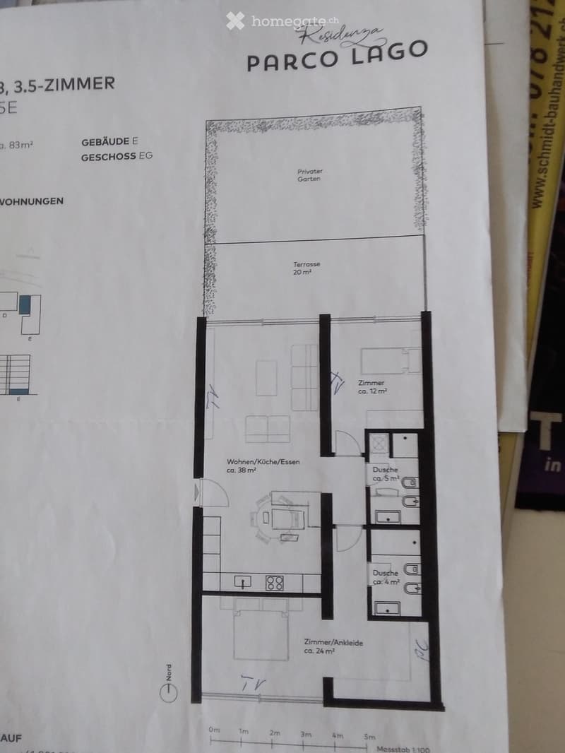 Floor plan of a 3.5-room apartment on the ground floor, including a living/kitchen/dining area, two bedrooms, two bathrooms, a hallway, and a private garden with a terrace.