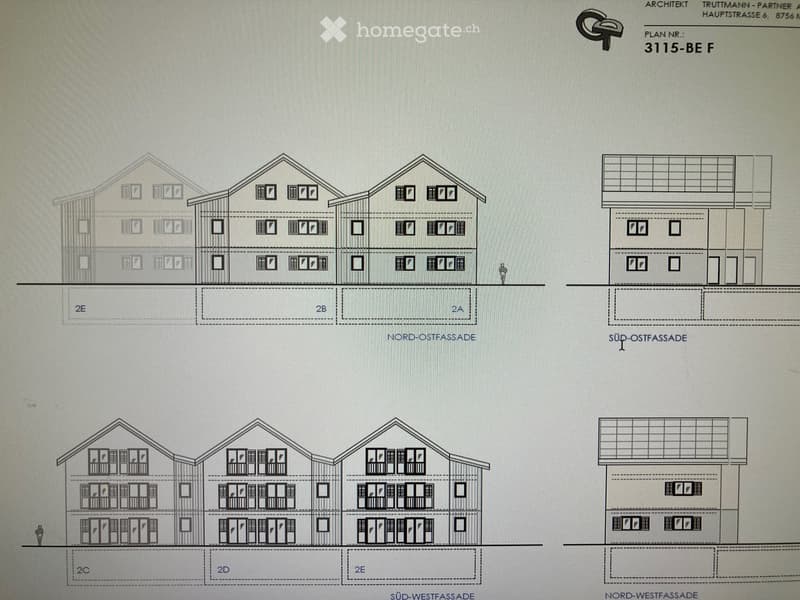 Architectural floor plan showing multiple residential units with labeled facades (Nord-Ostfassade, Süd-Ostfassade, Süd-Westfassade, Nord-Westfassade) and unit numbers (2A, 2B, 2C, 2D, 2E).