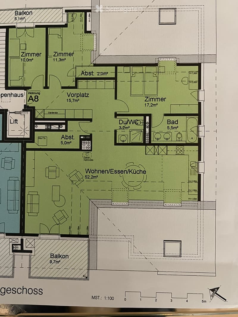 Floor plan of a residential unit showing a living/dining/kitchen area, two bedrooms, a bathroom, a balcony, and a hallway.