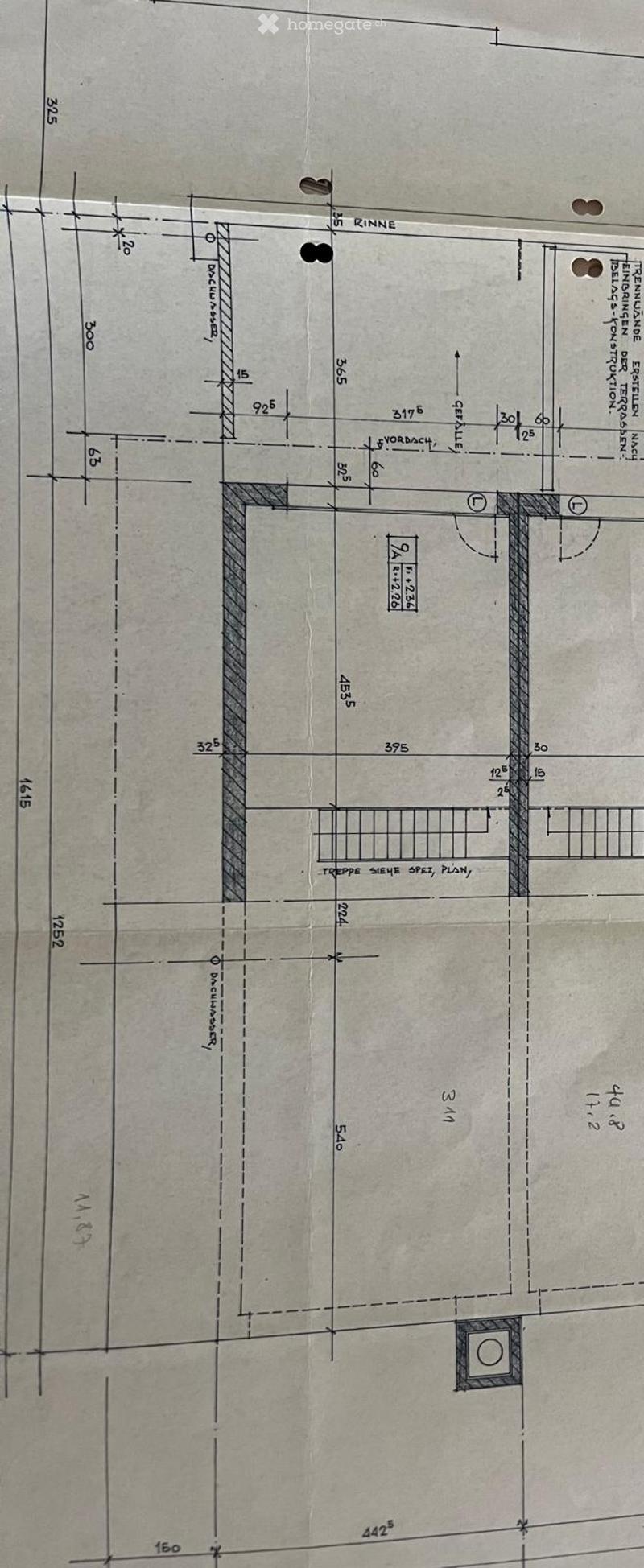 Floor plan of a residential space showing dimensions, labeled areas including a kitchen, living room, and bedroom, with measurements and structural details.