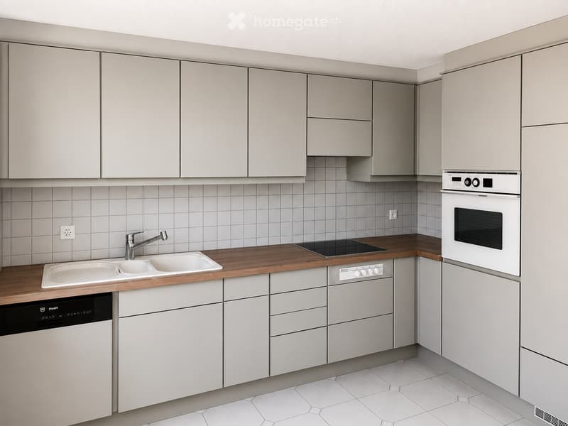 Modern kitchen with light grey cabinets, wooden countertop, stainless steel appliances, and tiled backsplash.
