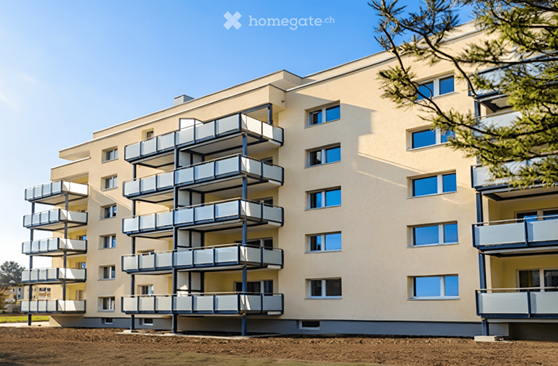 Modern multi-story residential building with light beige facade, multiple balconies, and large windows.