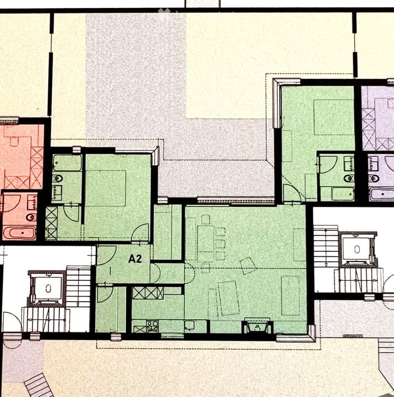 Floor plan of a residential space with multiple rooms including a living area, kitchen, bedrooms, bathrooms, and a balcony.