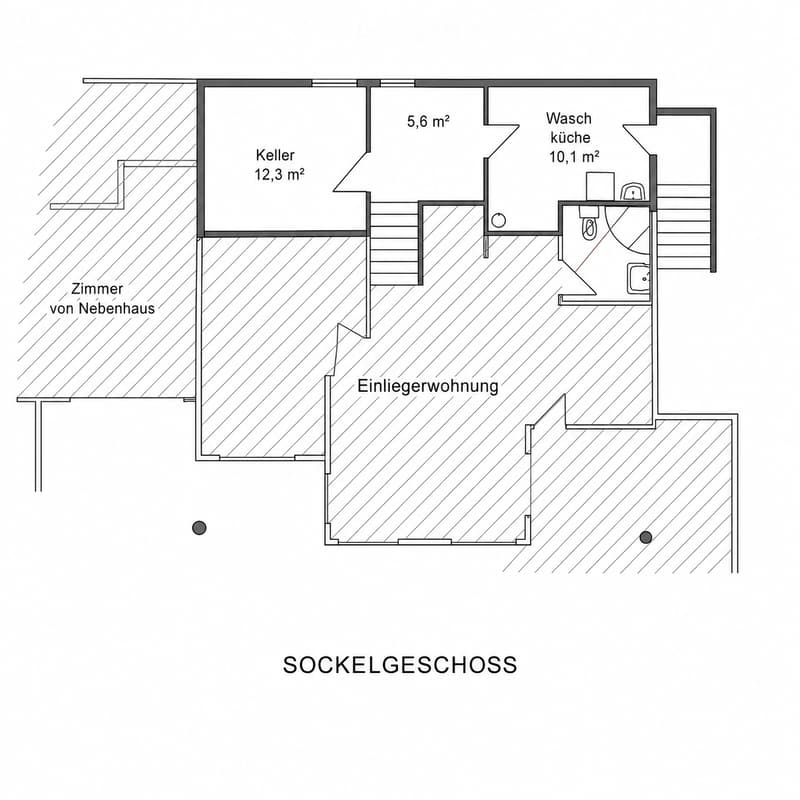 Floor plan of a basement level showing a guest apartment, kitchen, bathroom, and storage area.