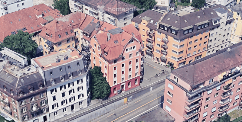 Urban city scene, row of multi-story buildings with varying architectural designs, street