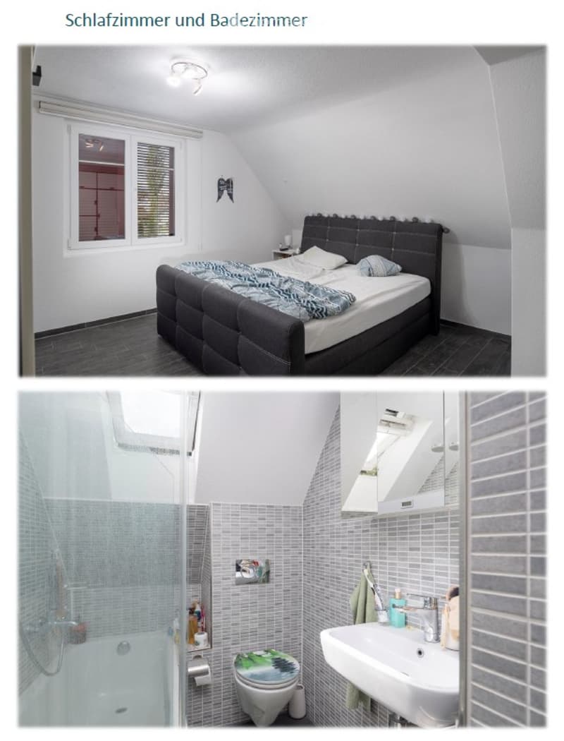 Cozy attic bedroom with a large window, modern bed with dark headboard, nightstand, and mirror on the wall.