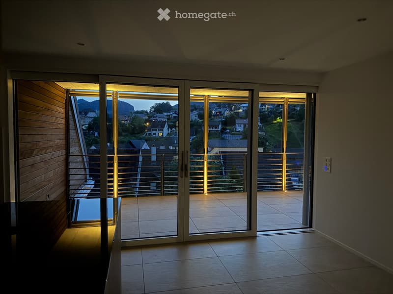 slide doors to balcony, wooden panels, view to cityscape, tiled floor