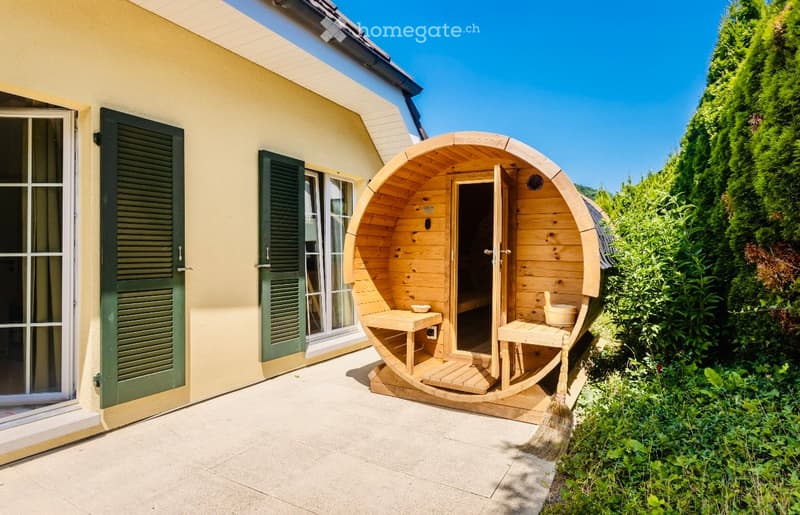 Wooden sauna, outdoor patio, wooden bench inside