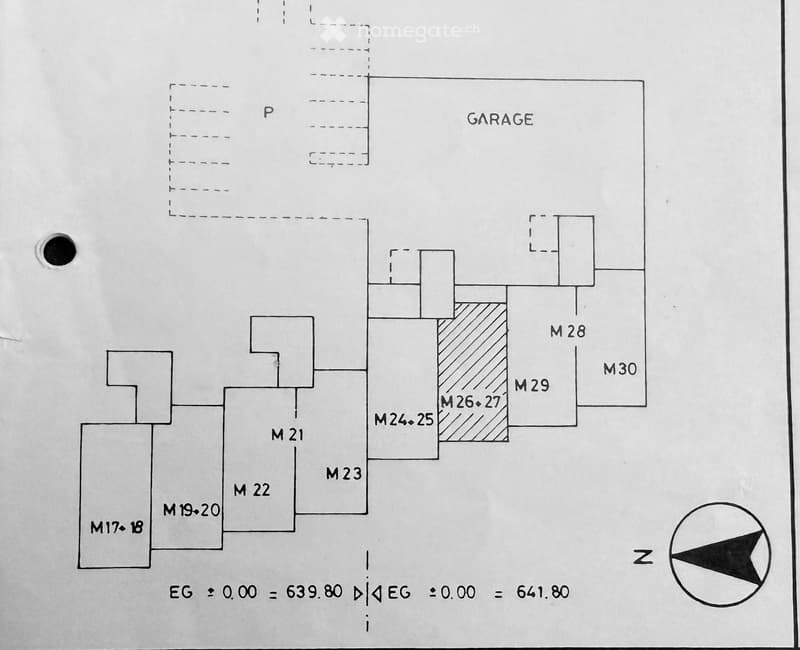 Floor plan showing multiple rooms labeled M17-M30, a garage, and a raised ground floor section.