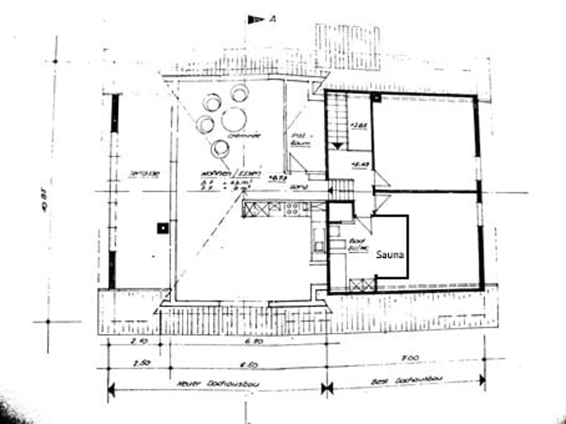Floor plan of a house showing a living room, kitchen, bedroom, bathroom, and sauna.