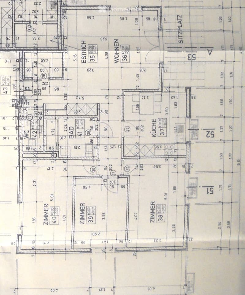 Floor plan showing a layout with multiple rooms including a kitchen, living room, bedrooms, bathrooms, and a sitting area.