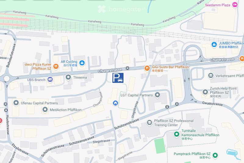 Map showing a parking area labeled "P" with surrounding streets and nearby businesses.