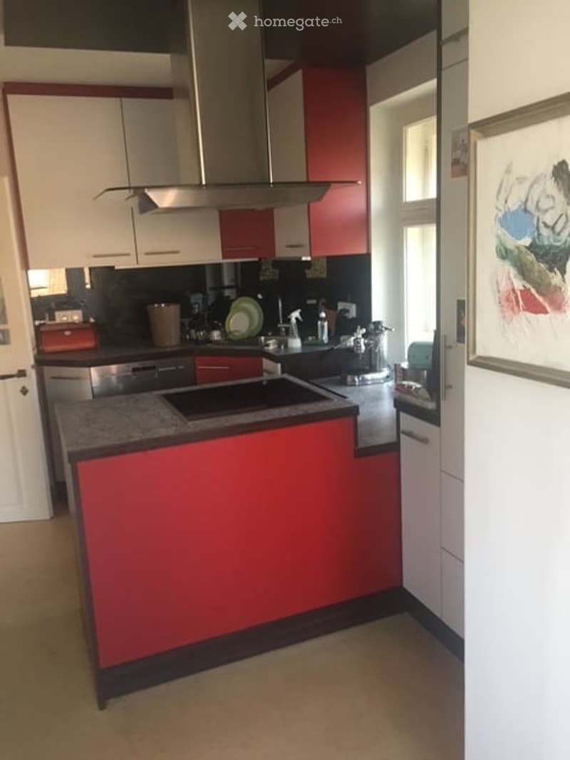 {"visible_features": [], "type": "Kitchen", "objects": ["cabinets", "countertop", "sink", "faucet", "dishwasher", "refrigerator", "stove", "microwave", "oven", "cupboard", "fridge", "faucet", "sink", "cupboard", "cupboard", "cupboard", "cupboard", "cupboa
