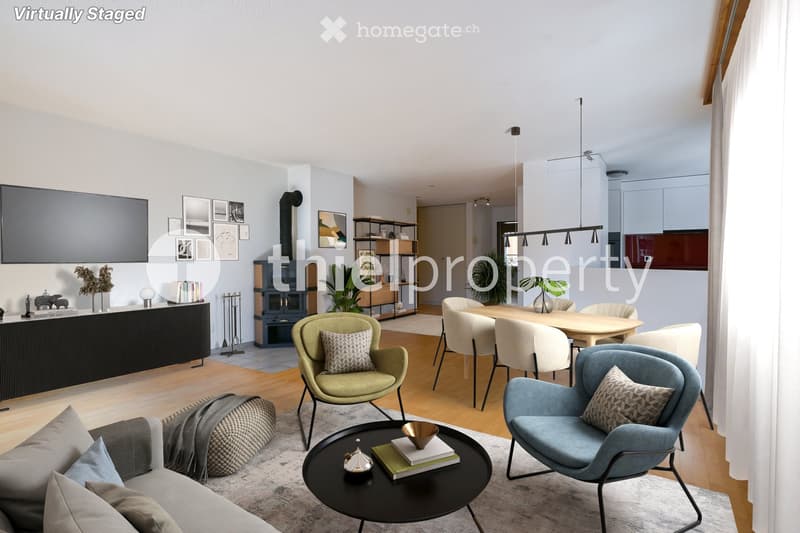 Modern living room with a grey sofa, coffee table, dining area, fireplace, and decorative shelves.