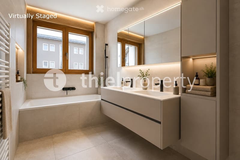 Modern bathroom with a bathtub, double sink, large mirror, and built-in storage. Features include a window with wooden frame, sleek lighting, and decorative plants.