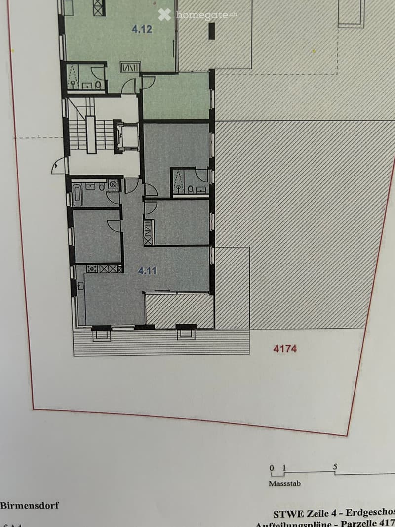 Floor plan of a residential unit with labeled rooms including a living area, kitchen, bedrooms, and bathrooms.